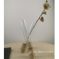 Καθαρό γυαλί που συνδέεται με βάζο λουλουδιών δοκιμαστικού σωλήνα